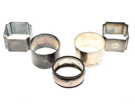 Pair of George V engine turned silver napkin rings, Birmingham 1924, a pair of Edward VII silver napkin rings, Chester 1907 a