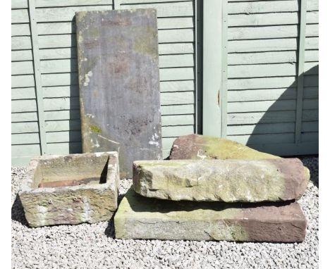 Assorted stone ware comprising: a square trough with square drainage hole, three pieces of ornamental stone, and a rectangula