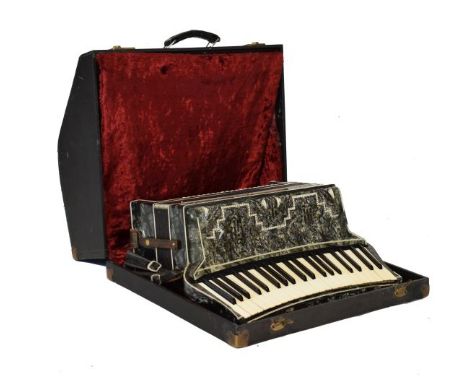 Mid 20th Century Italian cased accordion by Marenzi with 120 buttons and grey pearlised finish, in fitted case   Condition: 