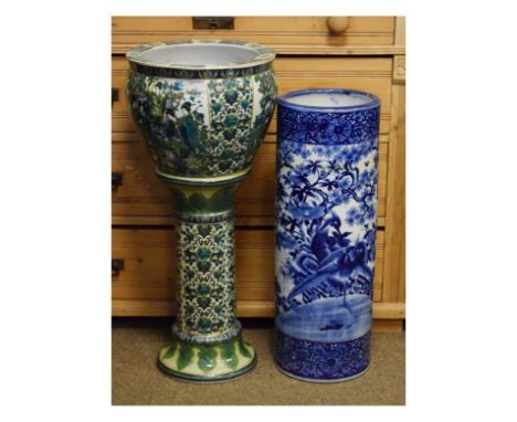 Early 20th Century Japanese blue and white porcelain stick stand of cylindrical design decorated with birds, together with an