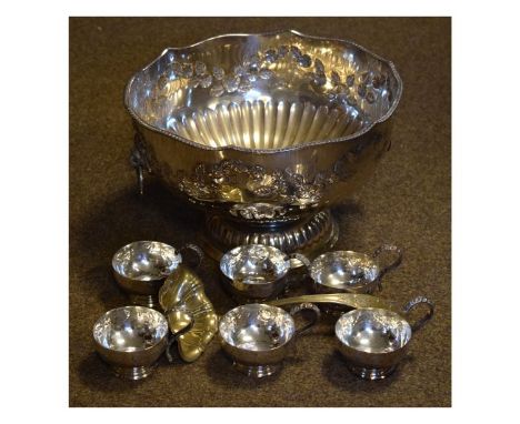 20th Century silver plate on copper punch bowl, six punch cups and ladle   Condition: 