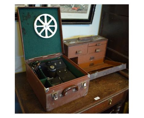 Cased Specto cine camera in brown leather carry case, together with an Arnold & Sons accessories case fitted with five drawer
