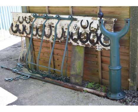 Selection of equestrian related items to include; two green painted metal poles, each with scroll bracket and rearing horse m