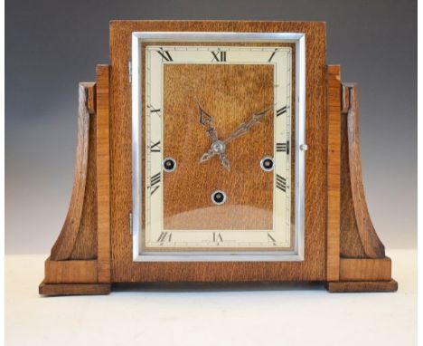 Art Deco oak cased three train chiming mantel clock, the movement by Enfield, chiming on gong rods in stepped architectural c