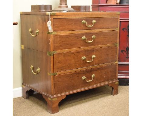 Reproduction mahogany two section military style chest of four long drawers standing on bracket feet   Condition: 