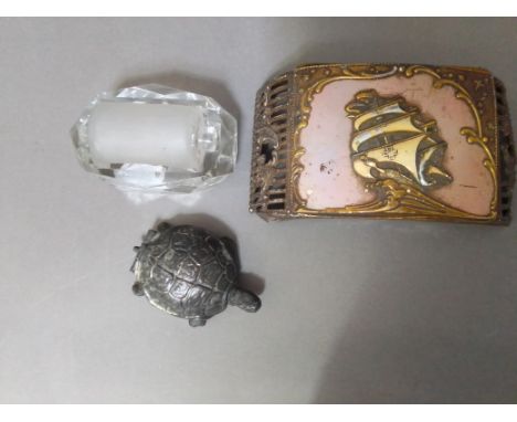 Two stamp boxes, one modelled as a tortoise and a glass stamp roller.