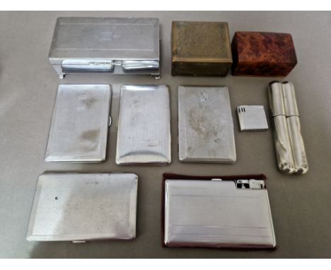 A collection of six vintage cigarette cases and boxes including a case with integral lighter plus a chrome cigar case and a l