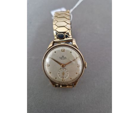 A Smiths Deluxe 9ct gold wristwatch, circa 1950s, case diam. 35mm, 15 jewel manual wind movement, hallmarked 9ct gold case, p
