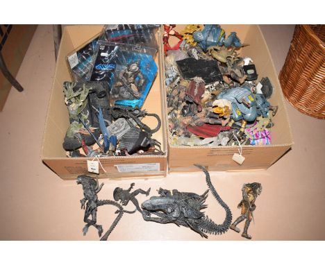 Predator figurines, by McFarlane Toys; 20th Century Fox Film Corp.; Prophet of Regret and Prophet of Mercy, by Joyride; three