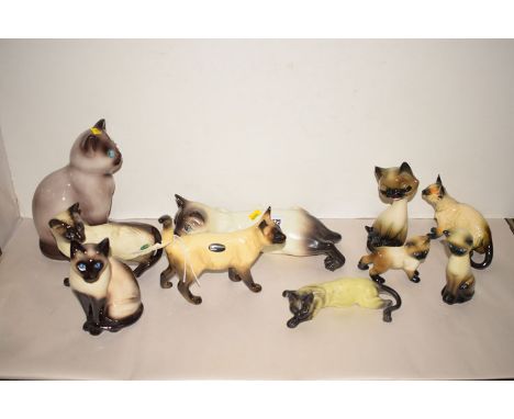 Ceramic Siamese cat ornaments by various maker, to include; Beswick; Coopercrafts; Continental; and others.  (10)  