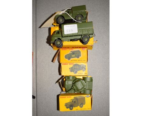 Dinky toys die-cast military vehicles: army one ton cargo truck 641; scout car 673; telephone service van 261, boxed.  (6)