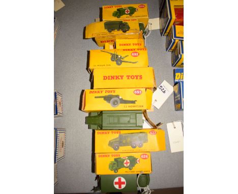 Dinky Toys - military die-cast vehicles, to include; military ambulance 626; armored vehicle 677; 7.2 Howitzer 693; army cove