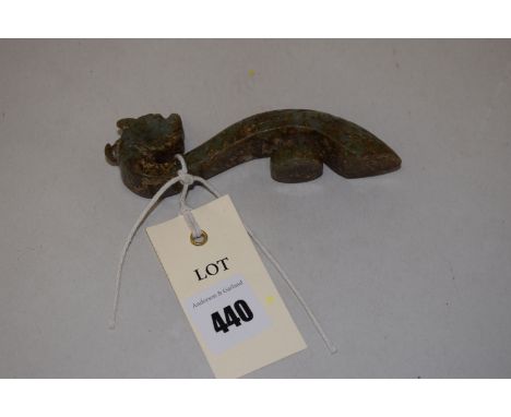Chinese hardstone, probably jade belt hook, of serpentine form with dragon head terminal, incised scroll form handle, length 