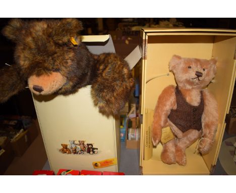 A Steiff teddy bear "Original", gold coloured stud and yellow label, boxed; and another Steiff 'British Collectors 1996', wit