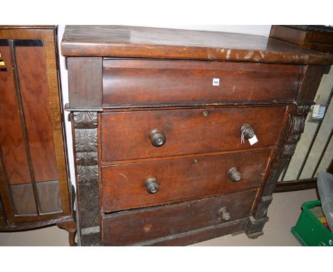 A Victorian mahogany scotch chest of four drawers (missing base).