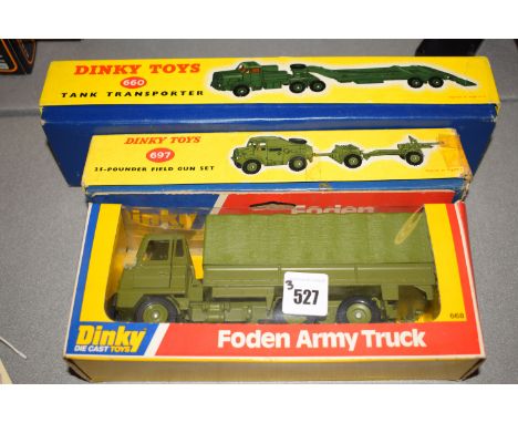 Dinky Toys - diecast military vehicles; Foden army truck 668; tank transporter 660; and 25-pounder field gun set 697, all box