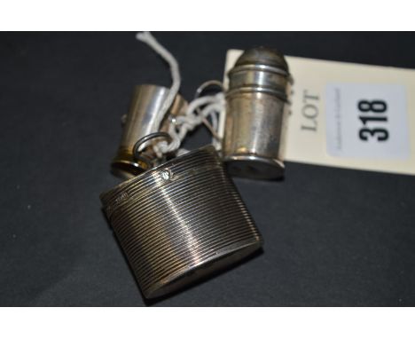 Three toy/miniature silver items, comprising: a Dutch silver tea caddy with reeded decoration, import marks Lewis Lewis, Lond