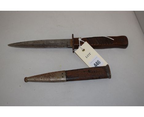 A 20th Century German dagger, by Gottlieb in metal scabbard, stained wood grip.