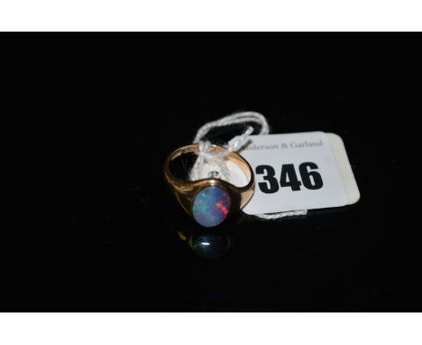 An opal doublet ring, 9ct. gold shank, ring size R 1/2.