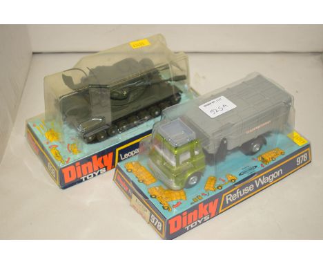 Two Dinky Toys die-cast vehicles - "Refuse Wagon 978" and "Leopard Anti-Aircraft Tanks 696", boxed.