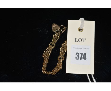 A 9ct. yellow gold gate link pattern bracelet, 9grms.