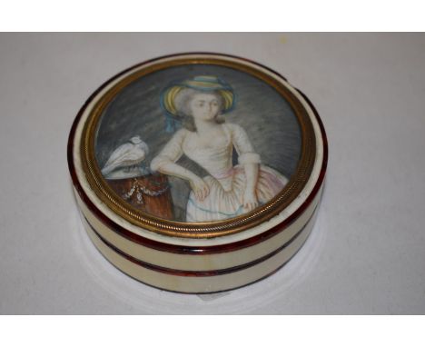 A 19th Century ivory and tortoiseshell powder box, the lid inset with painted miniature on ivory depicting a woman with her p