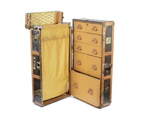 Goyard: a Goyardine Canvas Wardrobe Trunk1920sGoyardine printed canvas with leather trim and brass hardware, the interior ful