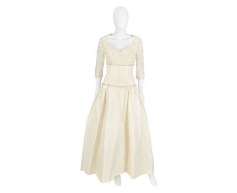 Valentino Couture: a Cream Silk and Lace BallgownSpring/Summer 2006Embroidered lace top with vertically stitched waist panel 