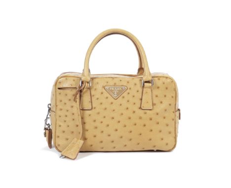 Prada: a Honey Ostrich Small Bauletto BagLight brown ostrich skin with silver hardwareCondition Grade A-25cm wide, 15cm high,