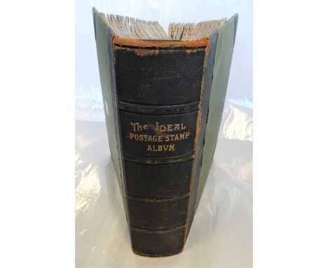 Vintage leather-bound 'Ideal' album with thousands of mint and used stamps including decent Cyprus with QV and KEVII both to 