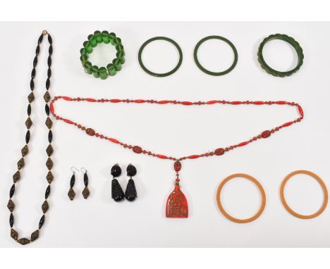 An assortment of vintage jewellery to include a 1930's likely Max Neiger Czechoslovakian Egyptian revival necklace (measures 