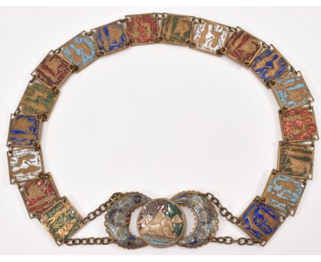 A 1920s Czech Neiger Egyptian revival metal belt having enamel decorated plaque links portraying Egyptian scenes. Measures 26