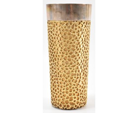 A 1970's&nbsp;Stuart Devlin silver hallmarked cup having a brushed gilt body with layered gilt nugget decoration and a silver