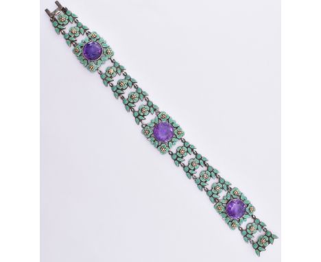 A 1920's / 1930's Art Deco era Bernard Instone silver enamelled bracelet having green enamelled floral spray links set with t