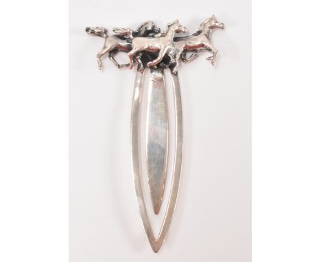 A silver bookmark having a galloping horses finial. Marked 925. Weight 10.5g. Measures 7.5cm.&nbsp;