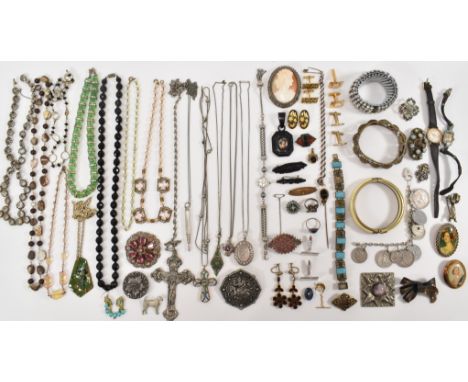 An assortment of 19th Century Victorian and later jewellery to include a Victorian silver white metal pocket watch chain (mea