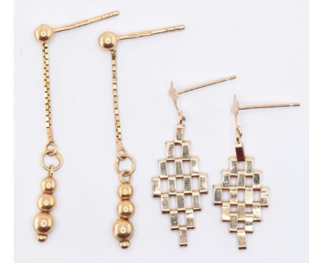 Two pairs of 9ct gold drop earrings to include a pair of gate link drop earrings ( marked 375 to the backs, measures 2.8cm) a