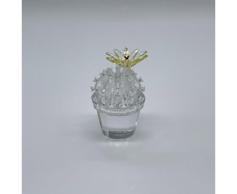 Part of the Exquisite Accents series. Cactus and vase made from clear crystal with a blossomed flower in jonquil and siam. Sw