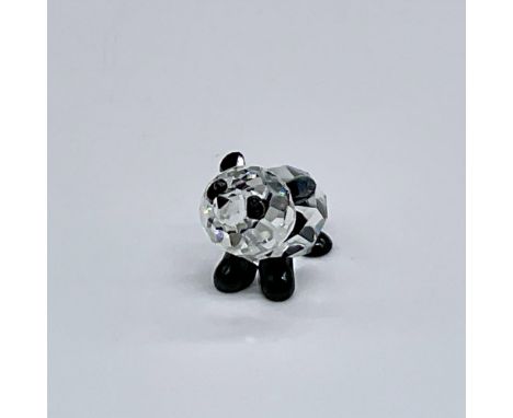 This adorable panda baby figurine is expertly crafted from a combination of clear and black crystal, capturing the lovable ch