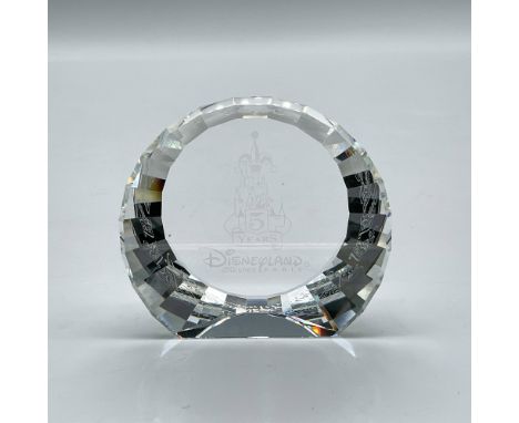 Crystal domed paperweight with etched Castle design and commemorative information. Swarovski mark. This item has its original