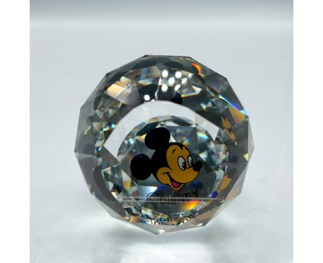 Faceted crystal globe designed with Mickey's smiling face. Felt bottom protects base. Disney mark. This item has its original