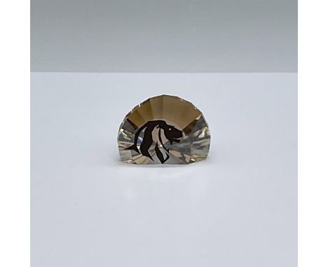 This paperweight is the SCS renewal gift from 2016. It features a majestic lion head on gold-toned crystal. This item has its