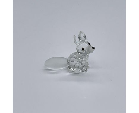 Clear faceted crystal figure of a little fox with a frosted tail and snout. Swarovski etched backstamp. Item number 7677NR055