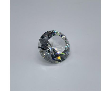Part of the Decorative Items for the Desk collection. Figural paperweight shaped like a cut diamond. Swarovski swan mark. Thi