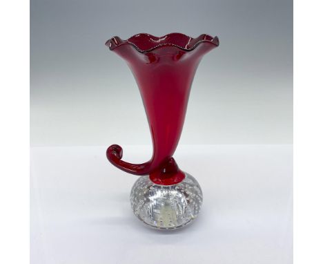 This gorgeous ruby red vase, with elegant, fluted edges, sits atop a clear paperweight featuring controlled bubbles. Issued: 