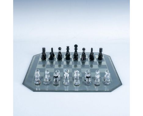 Original part of the Game Of Kings collection, then later moved to Crystal Classics - Home Accessories series. A glass chess 