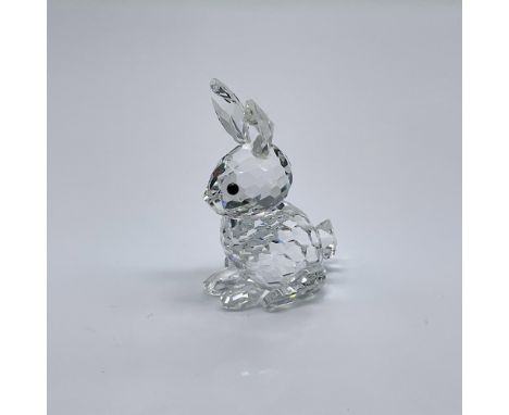 Part of the In A Summer Meadow collection. A clear crystal bunny with ears almost vertical. Black crystal eyes. Swarovski swa