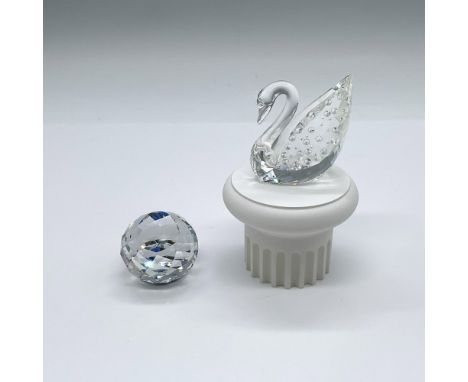 A clear crystal swan with 100 individual stones; commemorating Swarovski 100th year. Includes plastic column base and a Swaro