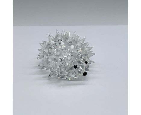 Clear crystal body with crystal conical for quills and jet crystal for eyes and nose. No whiskers. Swarovski backstamp. This 