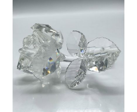 Lovely clear faceted crystal with smooth crystal stem with rhinestone crystal on leaves to emulate dew drops. Swarovski backs